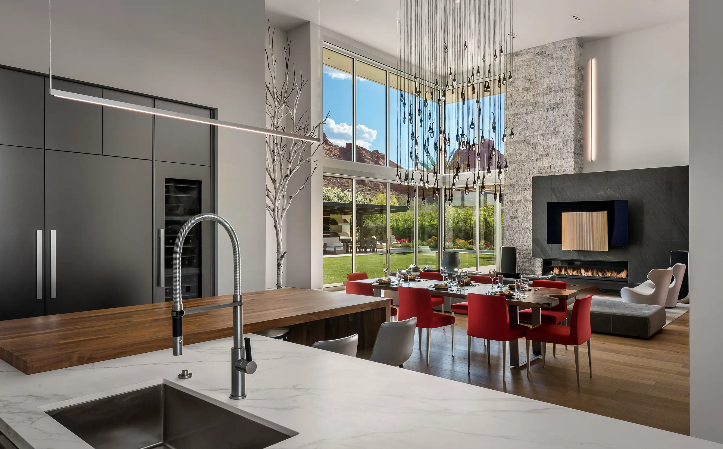 Open-plan kitchen of a Watt Integration project home in Scottsdale with integrated architectural audio